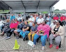  ?? Supplied ?? BOTH men and women, and especially taxi drivers, at Eshowe taxi rank listen to speakers relating their GBV experience­s at the hands of their spouses. |