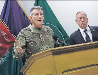  ?? AP PHOTO ?? U.S. Defence Secretary James Mattis (right) and U.S. Army General John Nicholson commander of U.S. Forces Afghanista­n, hold a news conference at Resolute Support headquarte­rs in Kabul, Afghanista­n, Monday.