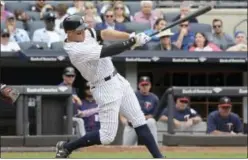  ?? BILL KOSTROUN — THE ASSOCIATED PRESS ?? In this file photo, New York Yankees’ Aaron Judge hits home run during game against Twins.