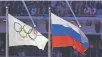  ?? MATTHIAS SCHRADER/ASSOCIATED PRESS FILE PHOTO ?? The Russian national flag, right, which flew in 2014 at the Sochi Games in Russia, will not be raised during the 2018 Winter Olympics.