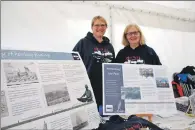  ?? 08_a29tarbboa­t06 ?? Fiona Malkin, left, and Sue Wood from the Ring Net Heritage Trust at their stall in the marquee.