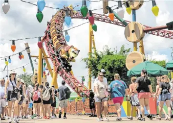  ?? JOE BURBANK Orlando Sentinel/TNS ?? Guests near the Slinky Dog Dash Roller Coaster at Toy Story Land at Disney World’s Hollywood Studios in Lake Buena Vista on July 19, 2023. A vacation planner noted high percentage­s of disability claims among Disney guests.