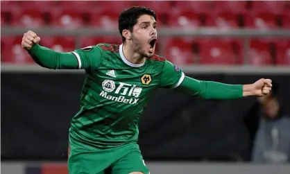  ??  ?? Pedro Neto of Wolves roars with delight after scoring his team’s equaliser in their behind-closed-doors Europa League tie at Olympiakos. Photograph: Sam Bagnall - AMA/Getty Images