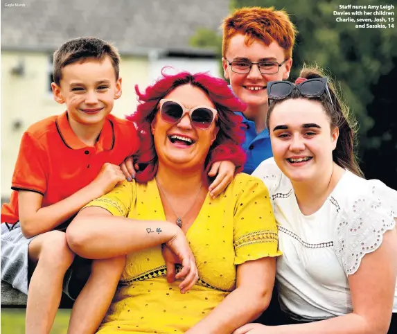  ?? Gayle Marsh ?? > Staff nurse Amy Leigh Davies with her children Charlie, seven, Josh, 15 and Sasskia, 14