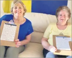  ??  ?? Marian Forbes and Pauline Power enjoying the bingo in their blue and yellow.