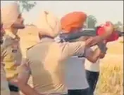  ??  ?? A video grab of the video in which Punjabi singer Sidhu Moose Wala can be seen firing from an assault rifle. Ht photo