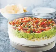  ??  ?? Ultimate SevenLayer Dip. Joe Keller, America's Test Kitchen