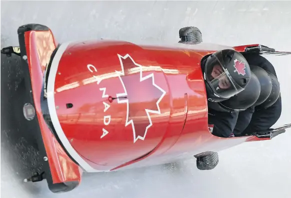  ?? MOHD RASFANMOHD RASFAN/AFP/GETTY IMAGES ?? Ben Coakwell of Moose Jaw takes part in a training session for the men’s four-man bobsleigh at the Olympic Sliding Centre in Pyeongchan­g.