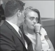  ?? AP/The Boston Herald/MATT WEST ?? Michelle Carter awaits her sentencing Thursday in a courtroom in Taunton, Mass., for encouragin­g Conrad Roy III to kill himself in July 2014. Carter was sentenced to 15 months in jail.