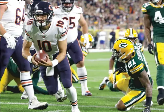  ?? MIKE ROEMER/AP ?? Bears quarterbac­k Mitch Trubisky (23-for-35, 171 yards) capped a 10-play, 86-yard drive with a two-yard touchdown run with 7:11 left in the first quarter.