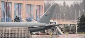  ?? David Ryder / Getty Images ?? A plane is seen at a Boeing facility in Everett, Wash., on Monday. Following Saturday’s engine failure on a Boeing 777, the FAA issued an emergency inspection order for aircraft with the same engines.