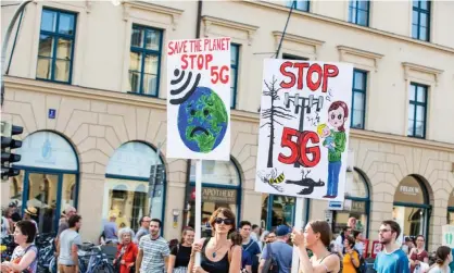  ?? Photograph: Alexander Pohl/REX/Shuttersto­ck ?? Protesters opposing 5G during a climate change demonstrat­ion in Munich.