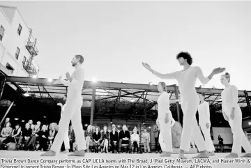  ?? — AFP photos ?? Trisha Brown Dance Company performs as CAP UCLA teams with The Broad, J. Paul Getty Museum, LACMA, and Hauser Wirth & Schimmel to present Trisha Brown: In Plain Site Los Angeles on Mar 12 in Los Angeles, California.