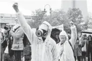  ?? CANADIAN PRESS FILES ?? Protesters in Toronto demonstrat­e outside NEB hearings last fall against Enbridge’s plan to reverse its Line 9 pipeline.