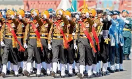  ?? — AP ?? Indian soldiers march in Red Square during the Victory Day parade marking the 75th anniversar­y of the Nazi defeat in World War II in Moscow on Wednesday.