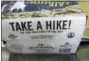  ?? LISA RATHKE / THE ASSOCIATED PRESS ?? A label with the slogan “Take a Hike” is displayed on the bottom of a six-pack of Long Trail Brewing Co., beer at Elm Street Market Friday in Montpelier, Vt.
