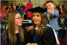  ??  ?? PRoUD: Vicky with Darragh and Amelia when she received an honorary fellowship from Waterford Institute of Technology