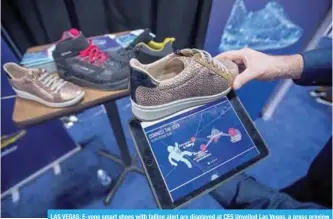  ??  ?? LAS VEGAS: E-vone smart shoes with falling alert are displayed at CES Unveiled Las Vegas, a press preview event before the start of CES. —AFP