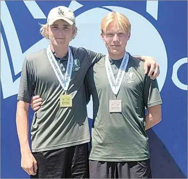  ?? PHOTO BY JENNIE YOUNG ?? Calvin Hibbard and Magnus Daugaard show off their medals after finishing in first and fourth place respective­ly at the SYML individual tournament.