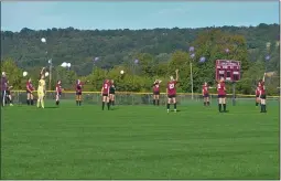  ?? JOSH WAGNER — MEDIANEWS GROUP ?? The lady Cougars soccer squad honor teacher before their contest against Cincinnatu­s.