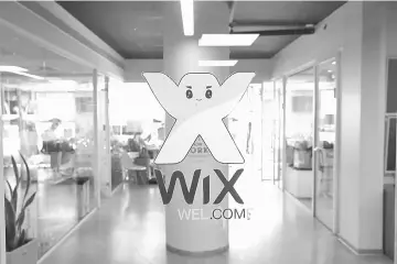  ??  ?? Employees work at website-designer firm Wix.com offices in Tel Aviv. — Reuters photo