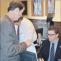  ?? DAVE STEWART/THE GUARDIAN ?? Peter Kelly, left, Charlottet­own’s chief administra­tive officer, confers with Coun. Jason Coady, chairman of the protective and emergency services committee, prior to the monthly meeting of council on Monday.