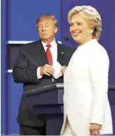  ??  ?? At a presidenti­al debate with Donald Trump