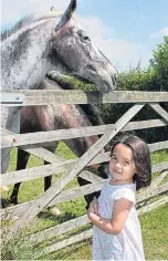  ??  ?? FREE REIN: Immy at the family- friendly farm