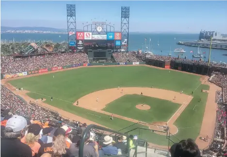  ?? PHOTOS: ANDREW MCCREDIE ?? The view from the upper deck during a Sunday afternoon San Francisco Giants game at AT&amp;T Park.