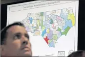  ?? GERRY BROOME — THE ASSOCIATED PRESS FILE ?? A state districts map is shown as a three-judge panel of the Wake County Superior Court presides over the trial of Common Cause, et al. v. Lewis, et al, in Raleigh, N.C.