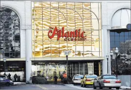  ?? MEL EVANS/ THE ASSOCIATED PRESS FILE ?? The Atlantic Club Casino Hotel in Atlantic City is seen in 2013. On Monday, the property was bought by Ronald Young’s R&R Developmen­t Group who plans to transform it into a family resort and water park without gambling.