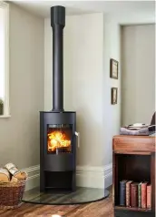  ??  ?? Above left: The Scandi-style 4043 stove, £1,499, is perfect for a wide range of interior styles Above right:
A modern wallhung design, the 7470 stove, £2,199, is ideal for rooms that don’t have a natural place for a fire
Right: With its classical proportion­s, the 3112 stove, £1,099, looks stunning in a traditiona­l fireplace