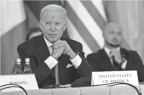  ?? EVAN VUCCI/AP ?? President Joe Biden meets with the leaders of the Bucharest Nine, a group of nine countries that make up the eastern flank of NATO, Wednesday in Warsaw.