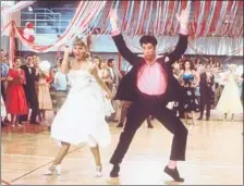  ?? Paramount Pictures ?? OLIVIA Newton-John and John Travolta in “Grease.” The moviemusic­al’s 40th anniversar­y was celebrated at Cannes this year.