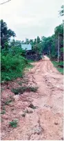  ??  ?? The road at Venkateswa­ra Colony is damaged by tractors carrying away soil from Bodagutta.