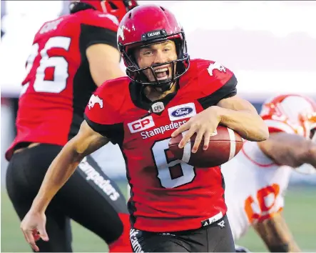  ?? GAVIN YOUNG. ?? Calgary Stampeders punter Rob Maver runs the ball for a first down in the fourth quarter of Saturday’s game against the B.C. Lions at McMahon Stadium. Maver scampered 24 yards on the play, contributi­ng to a 27-13 decision that stood as the Stampeders’...