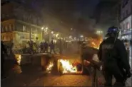  ?? CLAUDE PARIS — THE ASSOCIATED PRESS ?? French riot police take positions in the city center during a yellow vest demonstrat­ion in Marseille, southern France, Saturday.