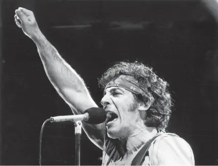  ?? THE COMMERCIAL APPEAL FILES ?? Dec. 13, 1984: Bruce Springstee­n performs at the Mid-south Coliseum on the first night of back-to-back sold-out shows. The concert opened as Springstee­n bounded onto stage with a manic rendition of "Born in the U.S.A." and the crowd went crazy.