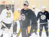  ?? GENE J. PUSKAR/AP ?? Penguins goalie Tristan Jarry, center, and teammates practice during the first day of training camp Thursday in Cranberry Township, Pennsylvan­ia.