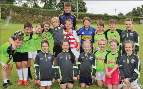  ??  ?? Some of the youngsters who took part in the recent Kilshannig Kellogg’s GAA Cúl Camp, pictured with Coach Eanna O’ Hanlon.