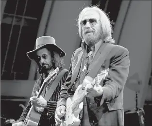  ?? Luis Sinco/Los Angeles Times/TNS ?? Tom Petty performs with the Heartbreak­ers on Sept. 21, 2017, at the Hollywood Bowl in Los Angeles.