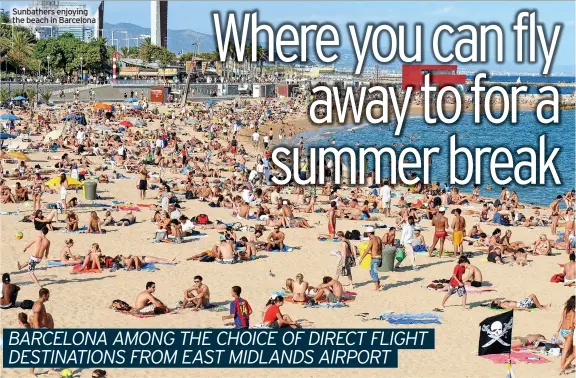  ?? ?? Sunbathers enjoying the beach in Barcelona