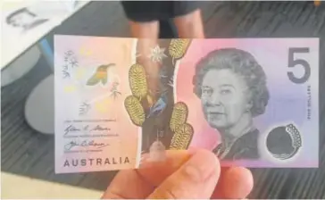  ?? // ABC ?? El viejo billete de cinco dólares australian­os