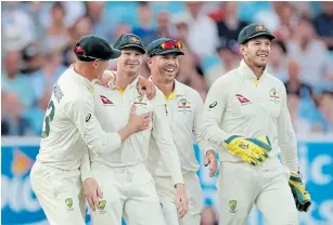  ?? Picture: ANDREW BOYERS/ REUTERS ?? SCORE TO SETTLE: Australia's Steve Smith celebrates taking the catch to dismiss England's Chris Woakes off the bowling of Mitchell Marsh.