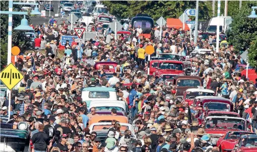  ?? PHOTO: STUFF ?? The Whangamata¯ Beach Hop always attracts thousands of spectators to the seaside town (file photo).
