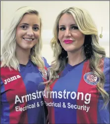  ??  ?? Amy Dumbleton (partner of LRFC midfielder Jake Holt) and Gemma Barnfield (partner of club captain Greg Downes) at the launch of Hinckley’s Leicester Road FC’s shirt draw promotion