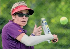  ?? PHOTO: BARRY HARCOURT ?? Southland tennis representa­tive Jan Hegan training at the Te Anau Tennis Club.