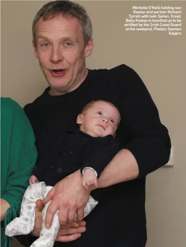  ?? Photos: Damien Eagers ?? Michelle O’Neill holding son Kealan and partner Richard Tyrrell with twin Senan. Inset: Baby Kealan is bundled up to be airlifted by the Irish Coast Guard at the weekend.