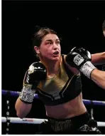  ??  ?? Katie Taylor clashes with Kimberly Connor.