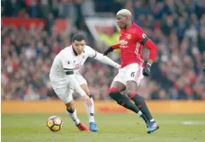  ?? — Reuters ?? Manchester United’s Paul Pogba in action with Watford’s Troy Deeney.